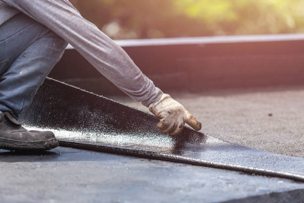 Professional Basement Waterproofing technician working in Bohemia, NY